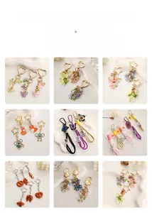 Collezione di portachiavi creativi in resina a forma di fiore, farfalla e pane per borse
