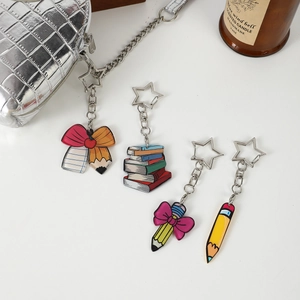 Cartoon acrylic bow pencil keychains with star-shaped metal clips for bag decoration