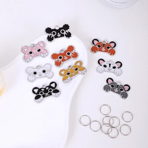 Cartoon bone-shaped zinc alloy pet ID tags in various colors with metal rings