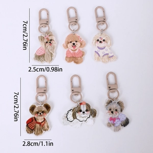 Set di sei portachiavi a forma di cane in acrilico con dimensioni mostrate di 7cm