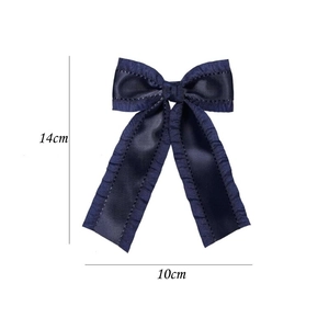 Dark navy satin bow hair clip with ruffled lace edges and 14cm size dimensions