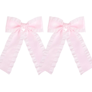 Detail view of light pink satin bow hair clips with delicate pleated ruffle edges