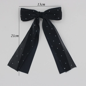 Elegant double-layered black bow hair clip with starry mesh streamers and size markers