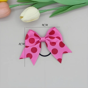 Roze haarstrik met rode stippen en bloemendecoratie, afmeting 9 cm x 8 cm voor meisjes