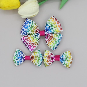 Close-up of leopard print ribbon hair bows in rainbow colors for girls' hair styling