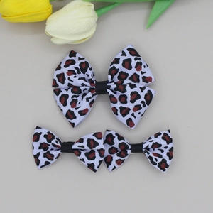 Chic leopard print bow hair clips set with red and black spots on high-density ribbon