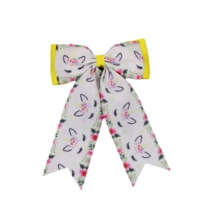 Grosgrain ribbon bow hair clip featuring unicorn print and pink floral motifs for girls