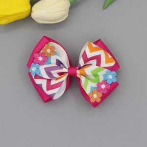 Sweet pink grosgrain ribbon bow hairclip with rainbow wave patterns and floral embroidery