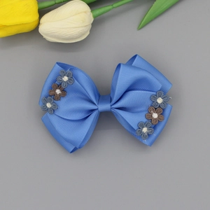 Blue ribbed bow hair clip with dainty hand-embroidered flowers for girls and kids