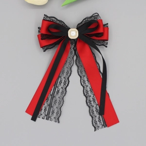 Vintage red and black lace bow hair clip with faux pearl center and rhinestone trim