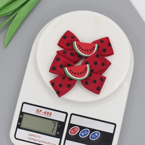 Sweet red polka dot bow hair clips with 3D watermelon slices for little girls