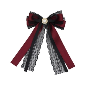 Elegant red lace bow hair clip with faux pearl and crystal center on white background