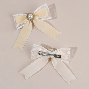 Lolita pearl lace bow hair clip with velvet fabric and sparkling rhinestone detail