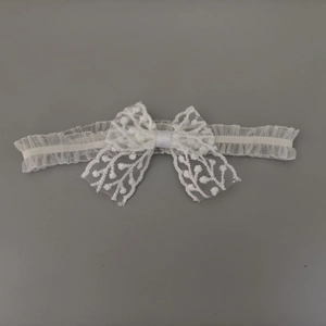 Bandeau élégant en dentelle blanche avec nœud pour bébé fille et accessoire de cheveux