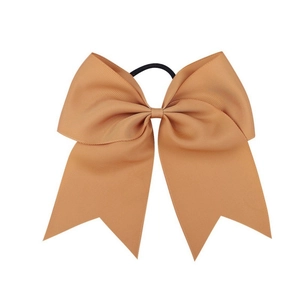 Macro detail of khaki grosgrain ribbon texture and elastic band on 8 inch bow hair tie