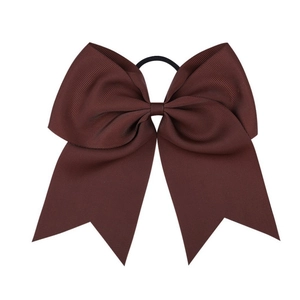 Detailed texture of an 8-inch dark brown grosgrain ribbon bow with a black elastic hair tie