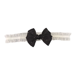 Bandeau bébé en dentelle blanche avec grand nœud en satin noir et points argentés