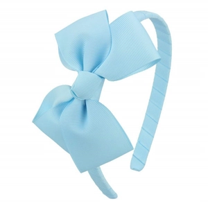 Detail showing high-quality light blue ribbed fabric and the large layered bow on the headband