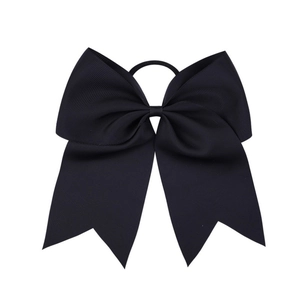 Detail of 8-inch black grosgrain ribbon hair bow with long tails and elastic tie