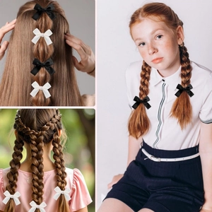 Elegant black and white ribbon bow hair ties for children hairstyles and braided ponytails