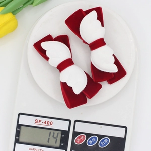 Barrettes à cheveux ailes d'ange en velours rouge et blanc pesant 14g sur balance