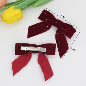 Elegant pair of wine red velvet bow hair clips with rhinestones and metal duckbill clips