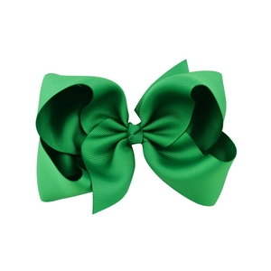 Detailed view of the 6 inch emerald green grosgrain ribbon bow with ribbed texture