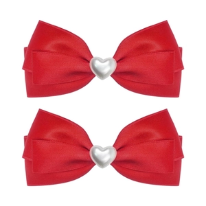 Elegant pair of red satin ribbon bow hair clips with heart-shaped pearl centerpiece