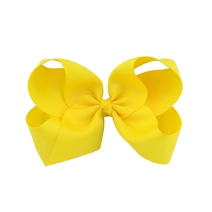 Detail of 6-inch lemon yellow grosgrain ribbon bow with elegant ribbed texture surface