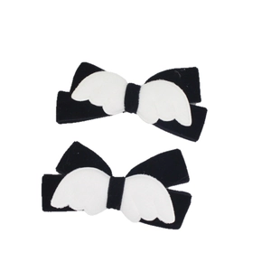 Paire de barrettes à cheveux en velours noir avec ailes d'ange blanches style gothique