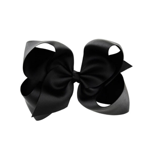 Detail of 6-inch black grosgrain ribbon bow with fine ribbed texture for hair clips