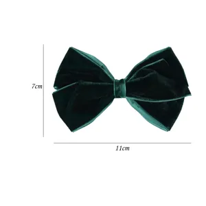 Solid color dark green velvet bow hair clip with elegant double layer ribbon design