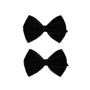 Detail view showing a pair of elegant double-layered black velvet bow hair clips for women