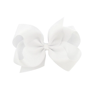 Detailed view of a 6-inch white grosgrain ribbon hair bow with ribbed fabric texture