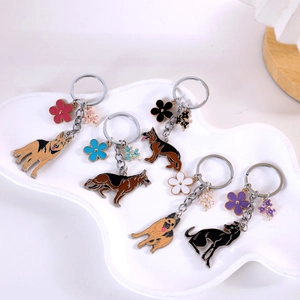 5-piece German Shepherd enamel keychain set with vibrant floral charms and metal rings
