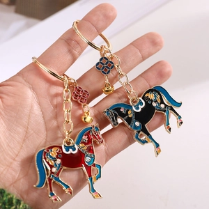 Chinese style enamel Tang horse keychains in red and black with golden alloy finish