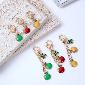Charming apple keychain set with colorful enamel pendants and elegant heart lobster clasps