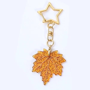 Porte-clés feuille d'érable en acrylique doré avec paillettes et fermoir étoile