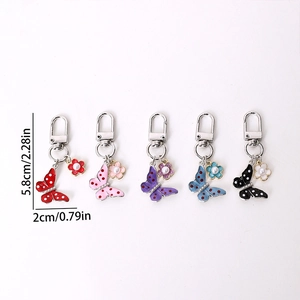 Five-piece butterfly keychain set in multiple colors with pearl accents and D-ring