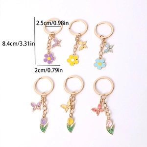 Floral butterfly enamel keychain set with gold metal rings and colorful charms