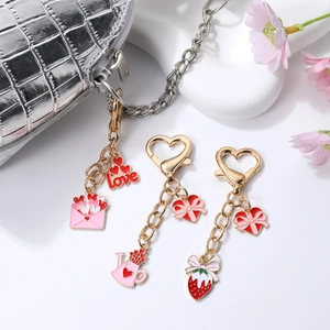 Creative Valentine's Day heart keychain set with floral enamel pendants for bag decoration