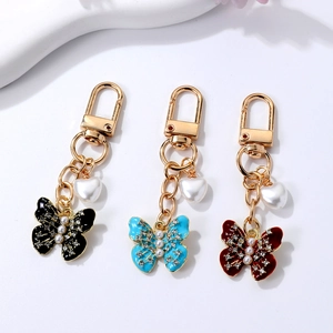 Lot de porte-clés pendentifs papillon avec perles et strass en trois couleurs élégantes