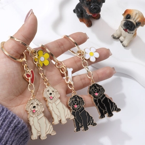 Set of four Golden Retriever dog metal keychains with cute enamel bone and flower charms