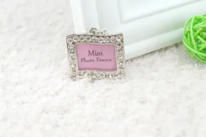 Silver mini photo frame pendant with rhinestones and pink paper inlay for pets
