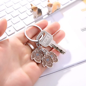 Metal dog keychain with enamel puppy pendants and silver lock charm accessory