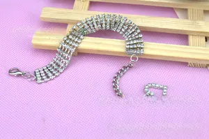 Detail of five-row rhinestone pet collar with extension chain and heart pendant