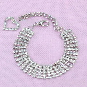 Detail of silver multi-row rhinestone pet necklace with heart pendant and lobster clasp