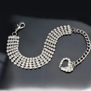 Detail of five-row rhinestone pet collar with lobster clasp and heart pendant