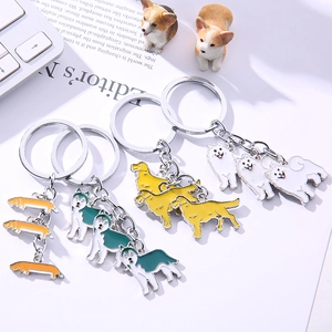 Enamel dog breed metal keychain set featuring Dachshund, Husky, and Golden Retriever designs