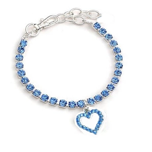 Silver pet necklace with blue rhinestones and hollow heart pendant on white background